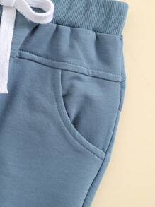 2pcs/Set Baby Boy Soft Comfortable Breathable Cute Colorblock Pocket Shirt & Solid Color Elastic Waist Sweatpants Outfit