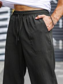 Manfinity Homme Quần ống đứng cạp rút dây rộng rãi cho nam, dành cho mùa thu - màu đen - Xem 6