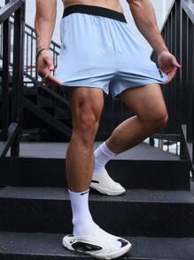 Manfinity Sport Corelite 男友风男士字母图案运动短裤健身短裤慢跑短裤 - 藍色 - 查看 3