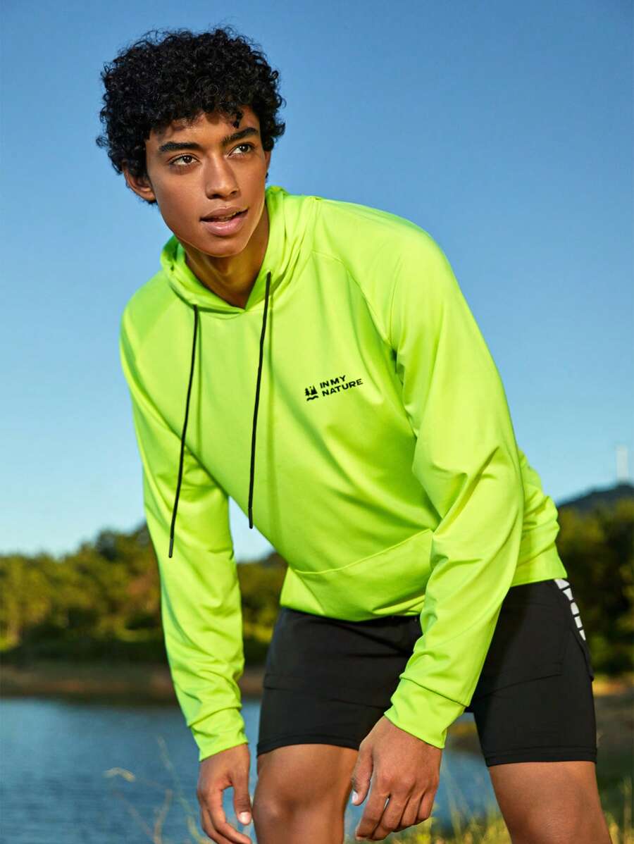 Manfinity Sport Corelite Männer Hoodie mit Buchstaben Grafik, Raglanärmeln, Outdoor
