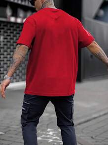 Manfinity Homme Camiseta casual de cuello redondo y manga corta con estampado para hombres, para uso diario