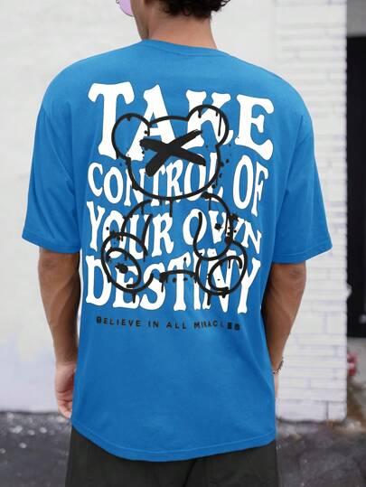 Manfinity RebelGame Hombres Camiseta con estampado de slogan y dibujos animados