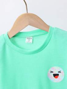 SHEIN Young Boy Cartoon Graphic Tee & Ripped Denim Shorts