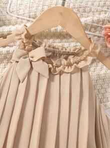 SHEIN Elladie kids Young Girl Bow Front Layer Hem Pleated Detail Halter Dress