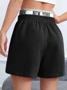SHEIN EZwear Letter Graphic Contrast Tape Waist Track Shorts