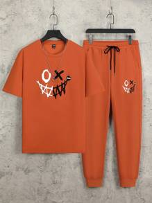 Manfinity Homme Hombres Halloween con estampado de dibujos animados Camiseta & de cintura con cordón Pantalones deportivos - Naranja - Ver 2