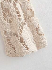 Jersey con patrón de paisley de manga con volante de croché