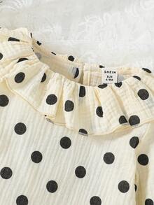 Đứa bé gái In vết tròn Polka Viền Ruffle Lỗ khóa trở lại Áo thun - Đen và trắng - Xem 4