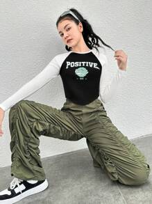 Pantalones anchos plisados con cordón y hebilla en forma de nariz de cerdo en unicolor tejido para adolescente