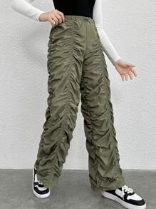 Pantalones anchos plisados con cordón y hebilla en forma de nariz de cerdo en unicolor tejido para adolescente