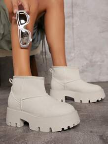 SHUZIA Faux Leather Lug Sole Ankle Booties