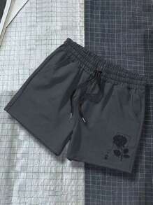 Manfinity Hypemode 男士玫瑰印花抽绳短裤 - 深灰色 - 查看 1