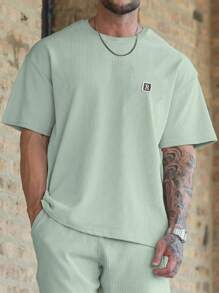 Manfinity Homme Hombres Shorts con camiseta de hombros caídos con parche de letra - verde menta - Ver 1