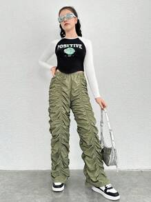 十幾歲女孩編織色塊長拉甘袖T卹，印花設計