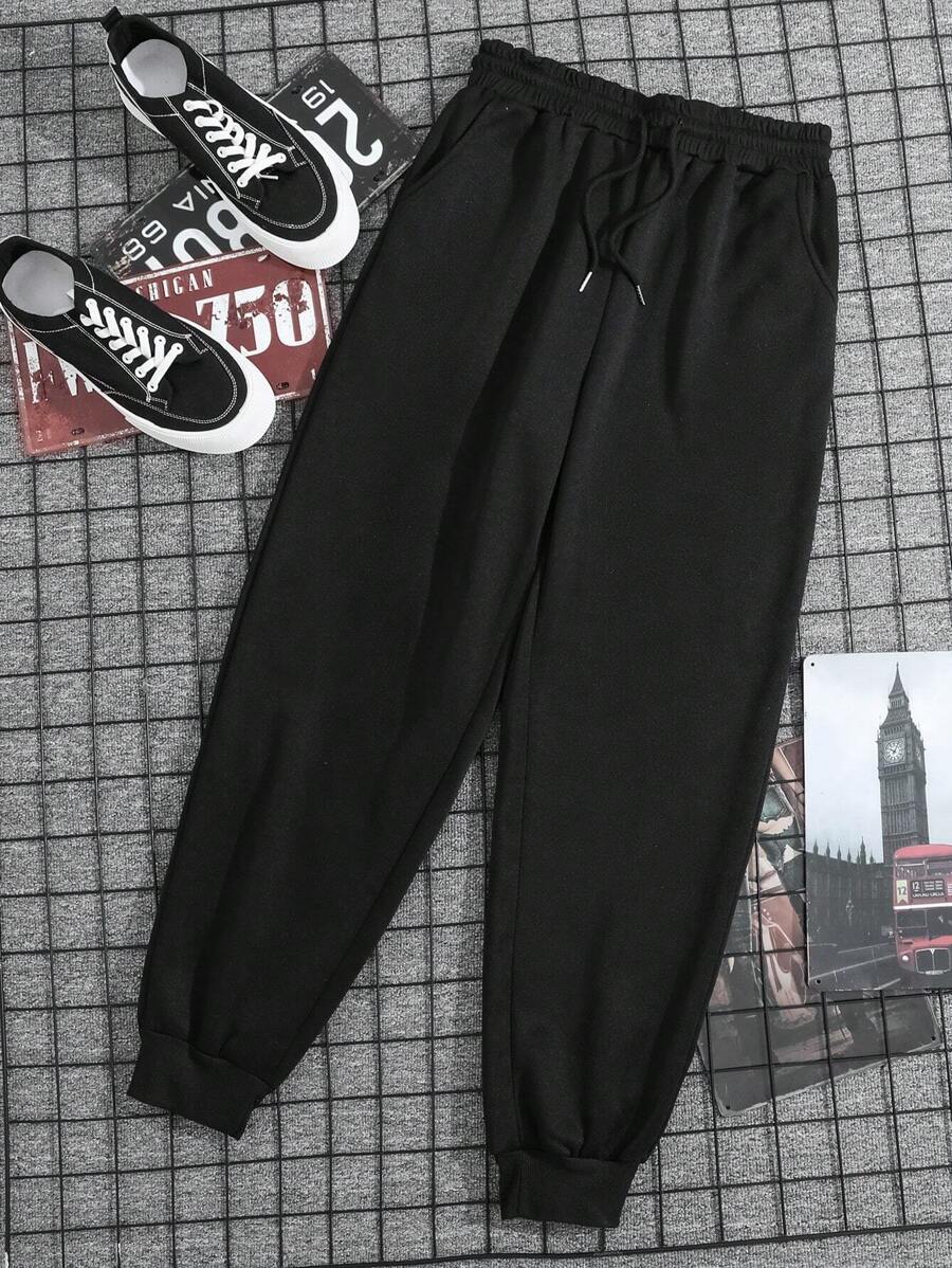 Manfinity Dauomo Hombres Pantalones deportivos unicolor de cintura con cordón - Negro - Ver 1