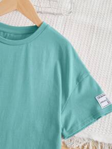 SHEIN Garota pré-adolescente Detalhe da Letra Remendada Bainha Curvada Camiseta & Perneiras