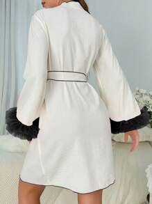 Women's Black And White Thigh Length V Neck Robe With Flare Sleeves And Contrast Binding