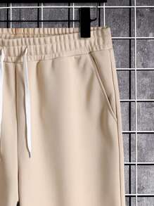 Manfinity Hypemode Lỏng lẻo Nam Dây rút Quần thể thao Với Túi xéo - Màu be - Xem 4