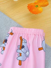 Conjunto de ropa de casa de niña preadolescente con camiseta estampada de koalas y pantalones largos