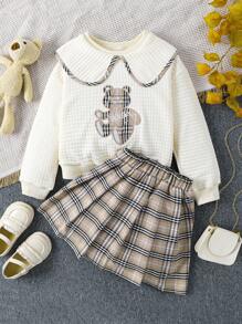 SHEIN Chica preadolescente de cuadros con patrón de dibujos animados de cuello exagerado Pullover & Falda fruncido - Albaricoque - Ver 1