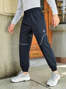 In My Nature 男士字母圖案拼接滾邊斜口袋戶外長褲