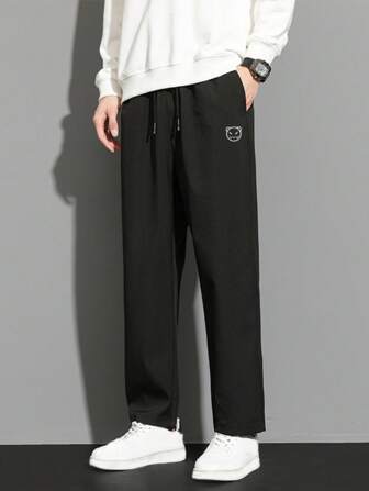 Men Letter Graphic Drawstring Waist Straight Leg Pants