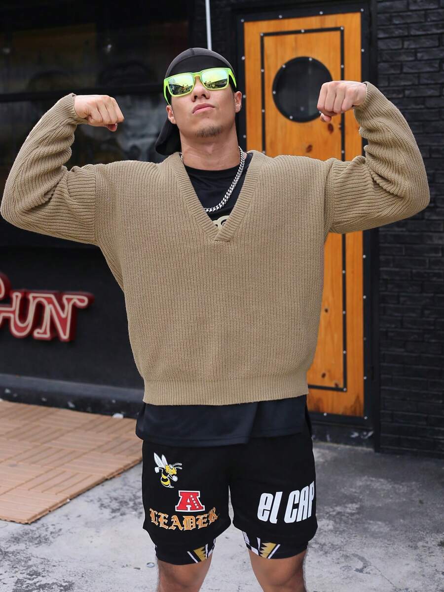 Manfinity Roughcore Men Solid Drop Shoulder Ribbed Knit V Neck Sweater