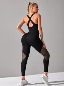 Easithlete Seamless Solid Criss Cross Backless Fishnet Panel Sports Jumpsuit - Black - View 1