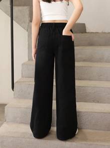 Einfache, vielseitige, verwaschene schwarze Jeans für Teenager