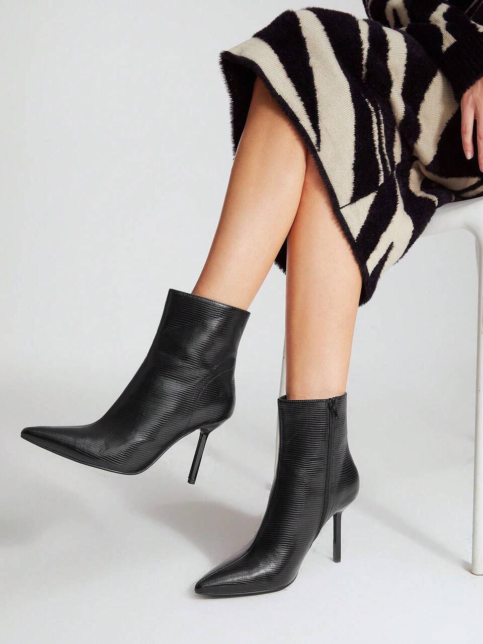 REPTILE PRINT HEELED ANKLE BOOTS