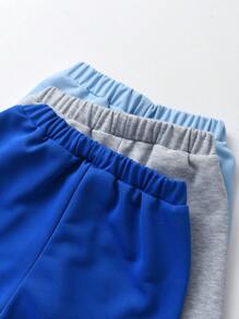 SHEIN Tween Boy 3pcs Solid Bow Front Track Shorts