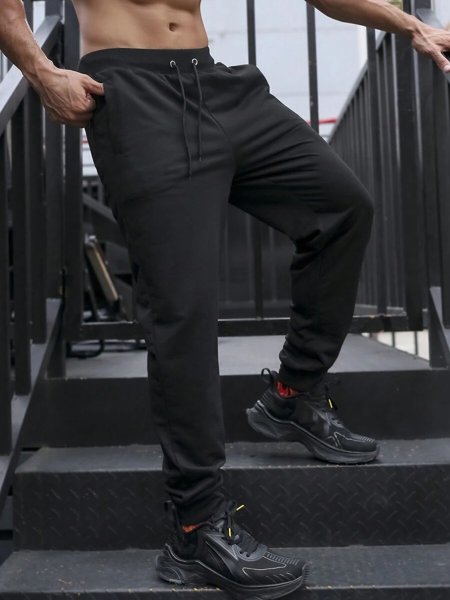 Manfinity Sport Corelite Nam Eo dây rút Túi nghiêng Quần thể thao - màu đen - Xem 1