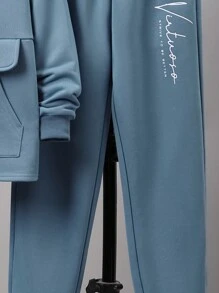 SHEIN Chico preadolescente Pantalones deportivos con capucha con estampado de slogan con bolsillo de canguro
