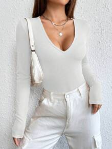Flirla Solid Plunging Neck Ribbed Knit Bodysuit