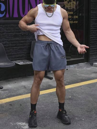 Manfinity Sport Corelite Men Letter Graphic Drawstring Waist Sports Shorts Jogger Shorts Sweat Pants