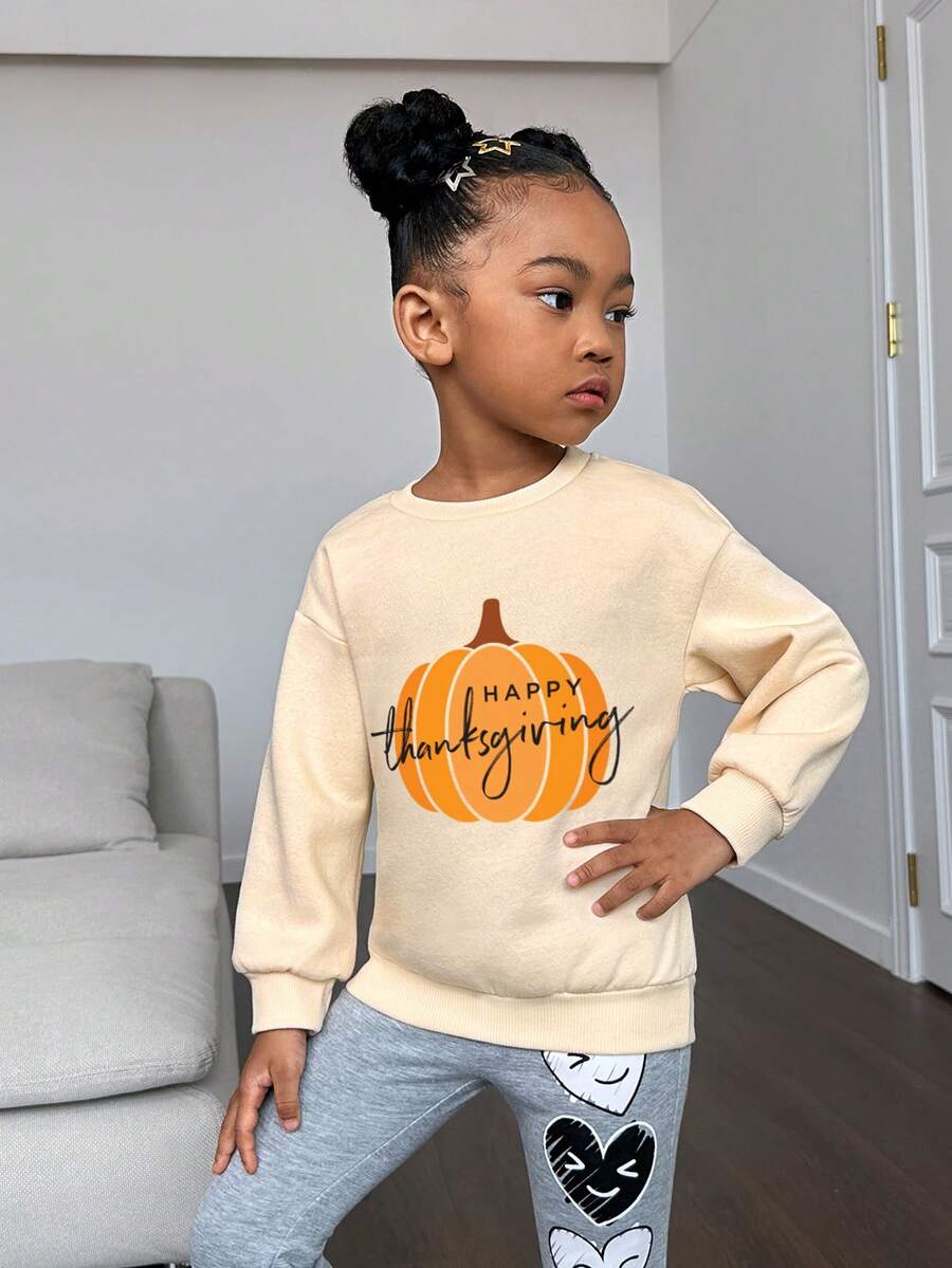 Áo thun trễ vai hình quả bí ngô và chữ cái của cô gái trẻ - Màu be - Xem 1