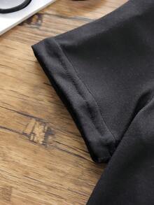 Chàng trai trẻ Ông già Noel Giáng sinh & Đồ họa Khẩu hiệu Áo thun - màu đen - Xem 3