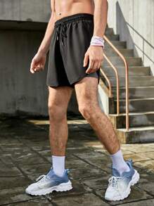 Manfinity Sport Corelite Uomo Shorts sportivi pannello a contrasto con coulisse a vita 2 in 1 con tasca del telefono