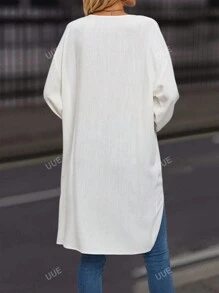 Blouse Encolure crantée Manches Bouffantes Asymétrique