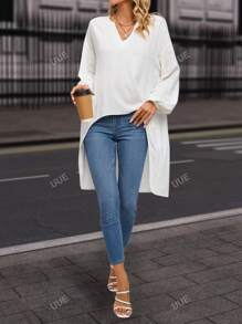 Blouse Encolure crantée Manches Bouffantes Asymétrique