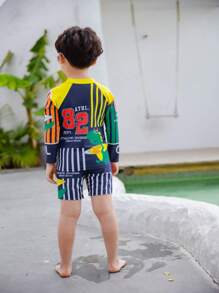 Young Boy Cartoon Graphic Beach Swimsuit - Navy Blue - View 2