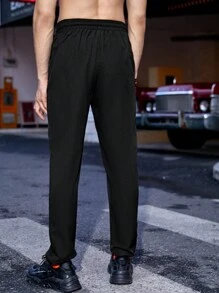 Manfinity Sport Corelite Nam Chất rắn Eo dây rút Túi nghiêng Quần thể thao - màu đen - Xem 5