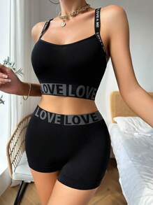 Conjunto de lencería deportiva de sujetador con cinta con letras de Yoga y bóxer para mujer
