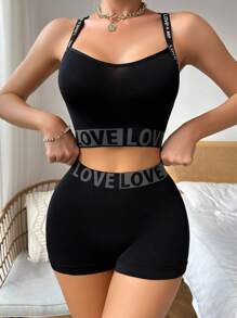 Conjunto de lencería deportiva de sujetador con cinta con letras de Yoga y bóxer para mujer