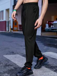 Manfinity Sport Corelite Nam Chất rắn Eo dây rút Túi nghiêng Quần thể thao - màu đen - Xem 3