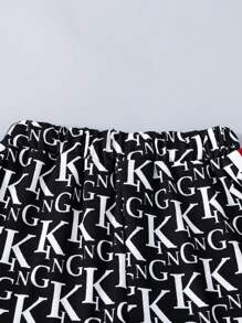 SHEIN Juego de polo de verano informal para bebé con impresión de alfabeto en toda la prenda y pantalón corto