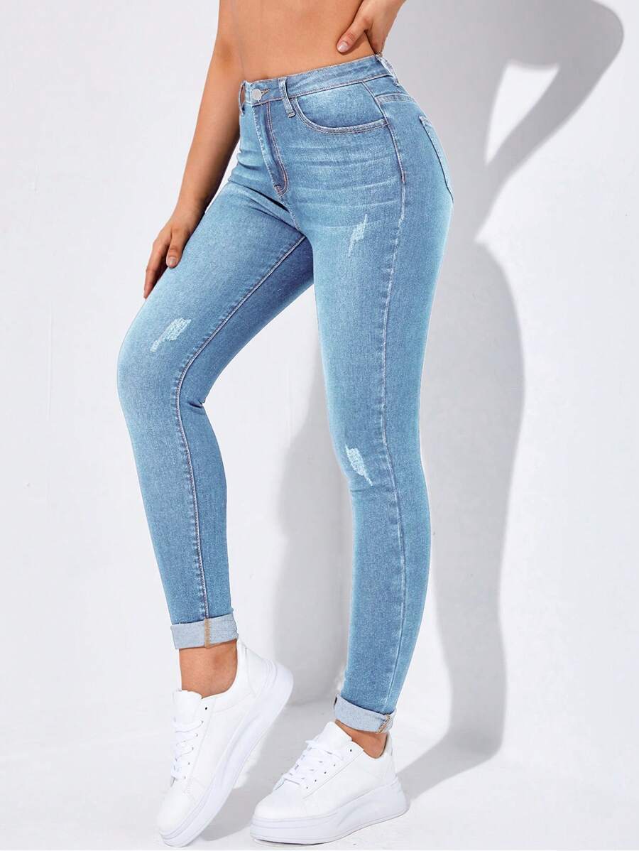 Flexra High-Waisted Button-Embellished Skinny Stretch Distressed Y2K Jeans - Light Wash - View 1