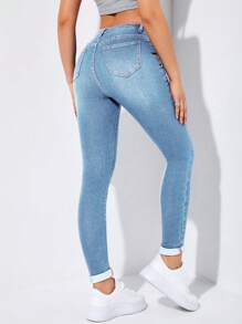 Flexra High-Waisted Button-Embellished Skinny Stretch Distressed Y2K Jeans - Light Wash - View 2