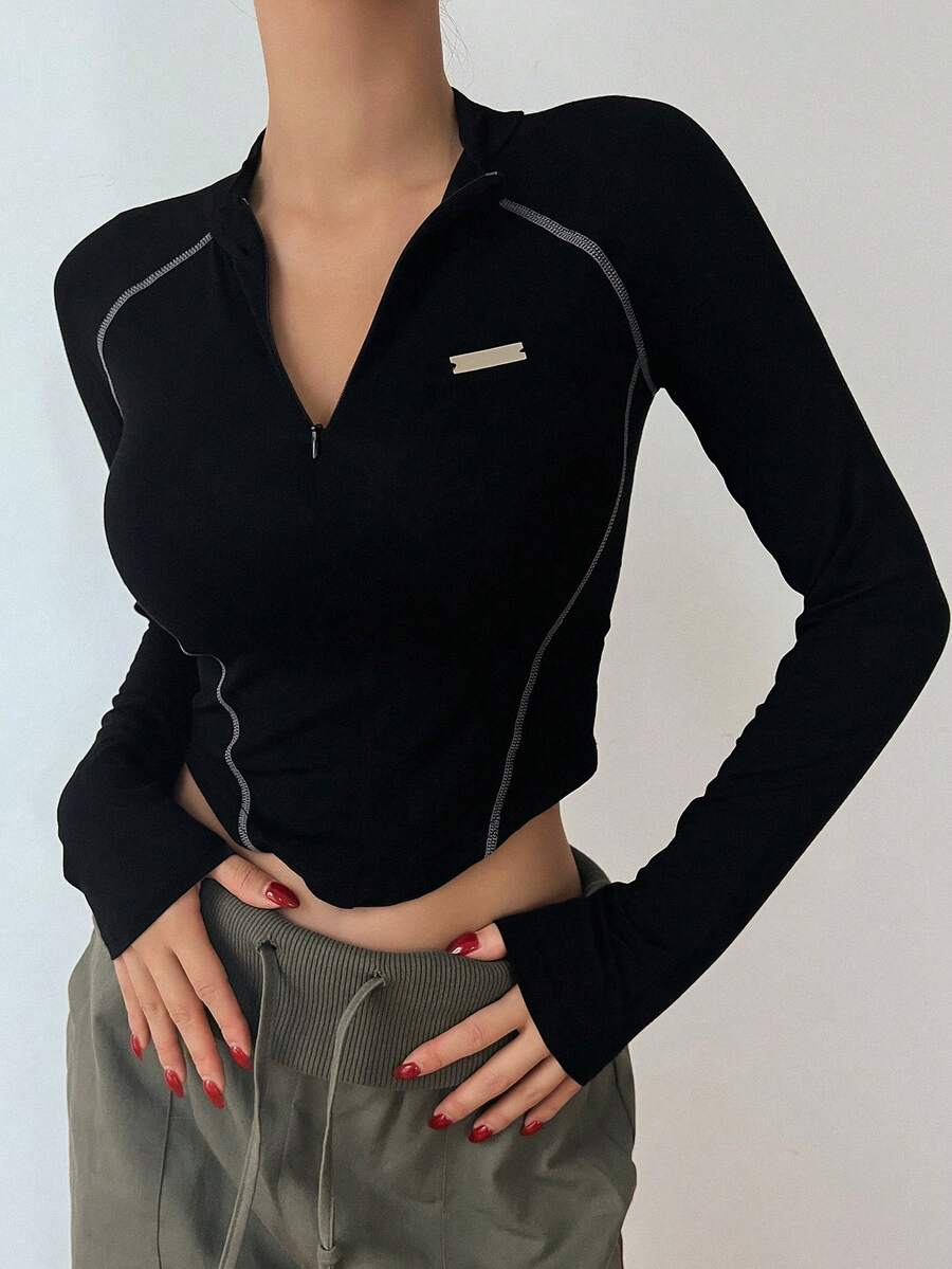 DAZY 字母拼接细节明线缝制插肩袖短款长袖T恤女款