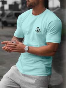 Manfinity RSRT Hombres Camiseta con estampado tropical - verde menta - Ver 1